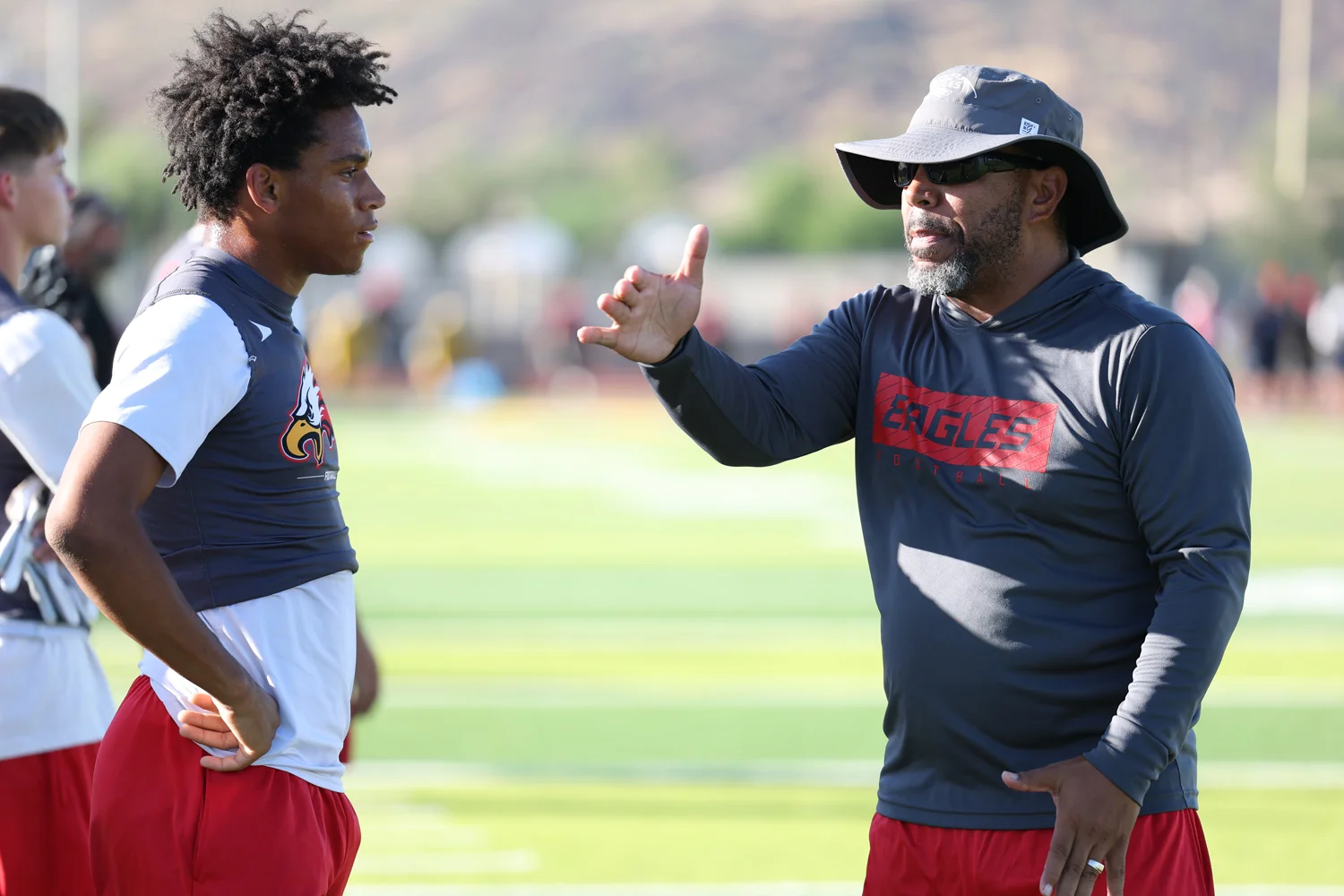 Coach Talking to the Ironwood player